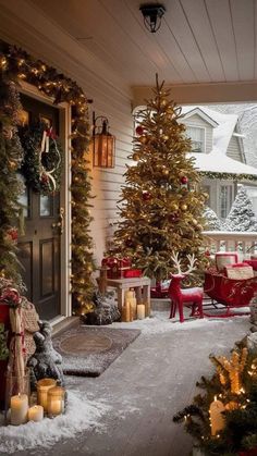 a porch decorated with christmas trees and presents