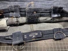 the back pocket of a pair of jeans that have been cut off and put together