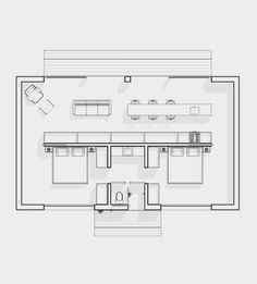 the floor plan for an office with two desks