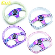 three different colored steering wheel covers on a white background