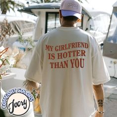 🔥 SAVE40: Use this code for a 40% discount when purchasing 3 or more items. Show off your sense of humor and love with our "My Girlfriend Is Hotter Than You" shirt. Perfect for Valentine's Day or any occasion when you want to let the world know just how lucky you are! This shirt is not just a fun and flirty statement piece; it's also a perfect gift for your boyfriend or girlfriend. Whether you're celebrating an anniversary, Halloween, or just looking for an aesthetic tee that expresses your feelings, this shirt is a must-have. I. ABOUT PRODUCT - Express your personality with our eye-catching patterns and meaningful words. Our products are comfortable, casual, and loose-fitting, making them perfect for everyday wear. Crafted from high-quality cotton, they're safe and comfortable for anyone Meaningful Gifts For Boyfriend, Boyfriend Aesthetic, Boyfriend Valentines, Boyfriend Outfit, Aesthetic Streetwear, Feeling Appreciated, Comfort Colors Shirt, Gifts For Your Boyfriend, Gift For Boyfriend