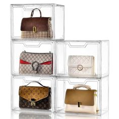 four clear acrylic boxes with purses on each side and one holding a handbag