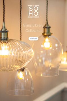 glass pendant light with brass bulb holder shot against a background of books Glass Kitchen Pendant Lights, Glass Library, Pendant Lighting Kitchen, Bedroom Lighting Ideas, Lights Over Island, Glass Pendant Lighting Kitchen, Tile Renovation, Clay Fairy House