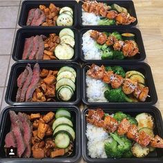 six plastic trays filled with different types of food