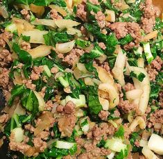 a mixture of meat and vegetables in a bowl