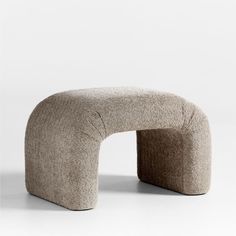 an unusual shaped bench made out of wool