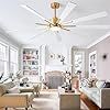 a living room filled with lots of furniture and a chandelier hanging from the ceiling