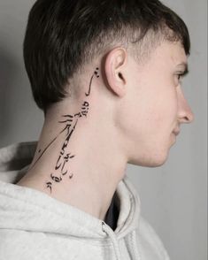 a person with a tattoo on their neck