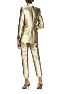 Cigarette pants in gold metallic moiré.Italian-made pants are designed with a slim cigarette-leg silhouette. Slim-leg silhouetteConcealed front hook and zip closurePlead front panelTwo side pocketsOne back pocketCropped lengthComposition: 52% Cotton, 35% Silk, 13% Metalized PolyesterLining: 100% CuproMade in Italy Luxury Gold Party Bottoms, Elegant Gold Trousers, Tailored Gold Suits For Evening, Gold Formal Bottoms, Gold Trousers For Work, Elegant Metallic Pants For Work, Chic Gold Pants For Workwear, Luxury Gold Formal Bottoms, Fitted Gold Pants For Evening