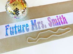 "Disco Party Sash. Disco Bachelorette Party Sash! Our beautiful 4\" wide, double-faced, luxurious satin sash is a perfect accessory for the Bride to Be Great for Bachelorette Parties and Girls Night Out! Holographic color will change with lighting! We make your sash to order, they are not pre-made, mass produced, or imported. 4\" wide ribbon allows for larger wording! Double-faced satin is a premium satin with a softer feel on the neck. No papery feel! Select sash and glitter color to the right. Disco Cowgirl Party, Disco Bride, Disco Bachelorette Party, Bride Sash, Bachelorette Party Sash, Holographic Color, Disco Bachelorette, Bachelorette Sash, Bride To Be Sash