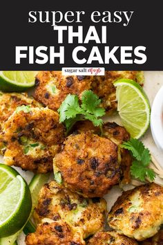 crab cakes with limes and cilantro on the side