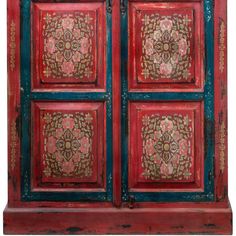 an old red and blue cabinet with floral designs on the doors, isolated against a white background