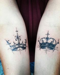 two people with matching tattoos on their legs, one has a crown and the other has a cross