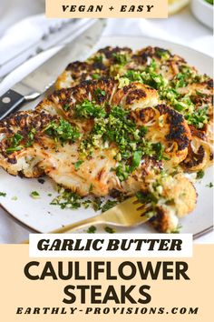 grilled cauliflower steaks on a white plate with parsley garnish