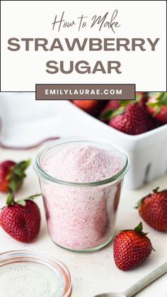 strawberry sugar in a glass jar with strawberries around it and the words how to make strawberry sugar