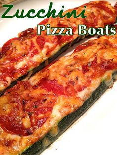 zucchini pizza boats on a white plate with the words zucchini pizza boats