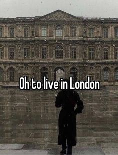 a person standing in front of a building with the words oh to live in london