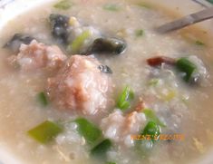 a bowl of soup with meat and vegetables