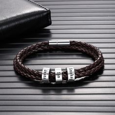 Personalized 3 Name Brown Braided Rope Leather Bracelet is a multi layered rope bracelet with an adjustable hook. It also has silver color round beads in the center which can be customized by engraving name on it. It is a versatile accessory that goes with all the outfits. It is great personalized gift for men. Features: Metals Type: Stainless steel Customized Type: NAME Gender: Men Bracelets Type: Charm Bracelets Chain Type: Rope Chain Item Type: Customized Bracelets Material: Metal Shape\patte Customized Bracelets, Mens Bracelet Personalized, Customised Bracelets, Leather Engraving, Personalized Leather Bracelet, Watch Engraving, Brown Leather Bracelet, Handmade Boot, Braided Leather Bracelet