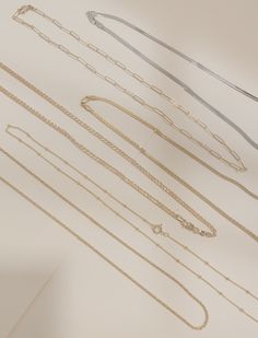 This statement Paperclip Chain is crafted from 14K yellow gold filled or sterling silver links, with an elongated cable design for an unparalleled shine. It includes a secure lobster clasp closure Now you can be sure to make a lasting impression, no matter the occasion. Ring Spacer, Hoop Charms, Layered Chains, Bridal Gifts, Birthstone Ring, Silver Roses, Silver Rose Gold, Paper Clip, Beaded Chain