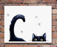 a black cat on a brick wall with snow flakes in the sky behind it