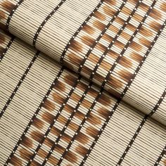 brown and white patterned fabric with lines on it