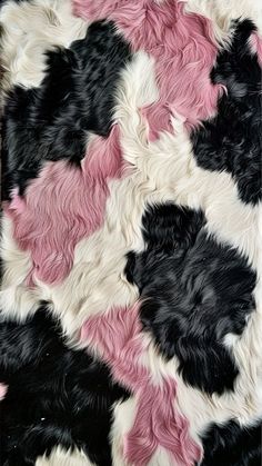 a black, white and pink animal print rug