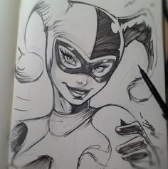 a drawing of a woman in catwoman costume