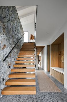 the stairs are made of wood and stone