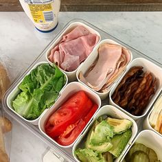 a plastic container filled with different types of food