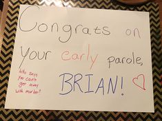 a sign that says congrats on your early parole, brain