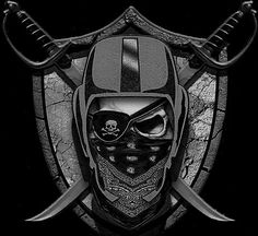 a black and white photo of a skull wearing a helmet with two swords in front of it