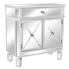 a white cabinet with mirrored doors and drawers