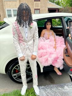 Gray And Pink Prom Couple, White And Pink Prom Suit, Pink Prom With Date, Matching Pink Prom Outfits, Prom Suits For Men Pink, Red And Grey Prom Couple, Pink Prom Dress And Date, Pink And Grey Prom Couple, Pink Dress Prom Couple