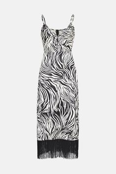 Striking zebra-inspired print woven midi dress with a sweetheart neckline
Sleeveless strappy design with fringing detailing along the hem
Fitted bodice with a flattering midi length
Lightweight and breathable woven fabric for warm weather wear
Adjustable spaghetti straps for a customized fit
Embrace your wild side with this eye-catching zebra print midi dress. Perfect for a night out on the town, this sleeveless number exudes confidence and edgy femininity. Style it with strappy heeled sandals and a clutch for a glamorous evening look, or dress it down with trainers and a denim jacket for a casual daytime vibe. The fringing detail adds movement and flair, making it an ideal choice for dancing the night away with friends. Zebra Dress, Lace Skater Dress, Weather Wear, Print Midi Dress, Strappy Sandals Heels, Halterneck Dress, Knee Dress, Going Out Dresses, Printed Midi Dress