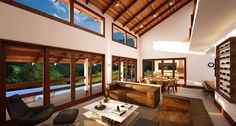 a living room filled with furniture next to a large open window covered in wooden slats