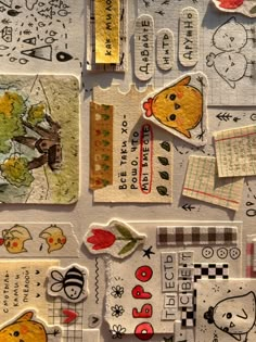 many different stickers and tags on a table