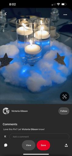 an iphone screen with candles in the clouds and stars on it, as well as other items