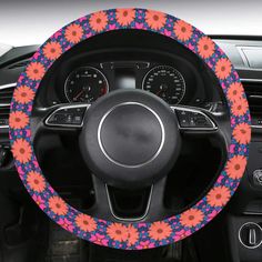 a steering wheel cover with flowers on it