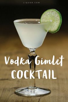 the vodka cocktail is garnished with a lime slice