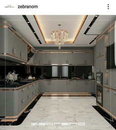 an image of a modern kitchen with marble counter tops and cabinets in the middle, along with chandelier lights