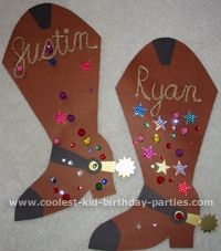 two cowboy boots with name tags on them, one is made out of paper and the other has sequins