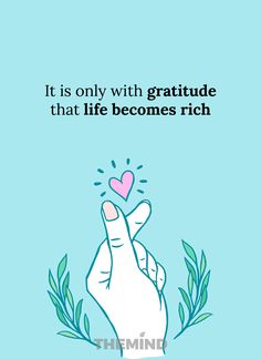 a hand holding a heart with the words it is only with gratitude that life becomes rich