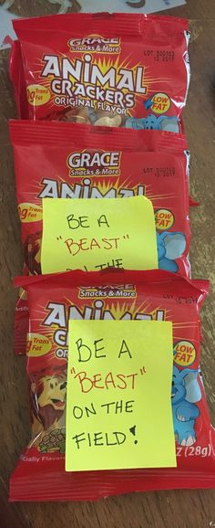 three bags of animal crackers with sticky notes on them