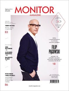 the front cover of a magazine with a man wearing glasses and a suit on it