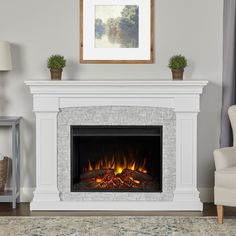 a living room with a fire place in the center and a chair next to it