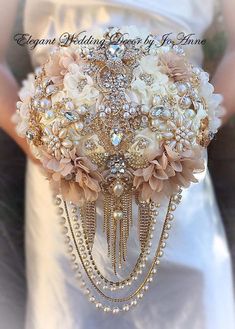 a bridal bouquet with pearls and flowers