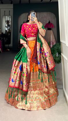 Get everyone's heart and attention by wearing this orange color half saree lehenga made of jacquard paithani material designed with beautiful zari weaving work.
This south indian, dhavani lehenga choli can be wear at any special festivals.