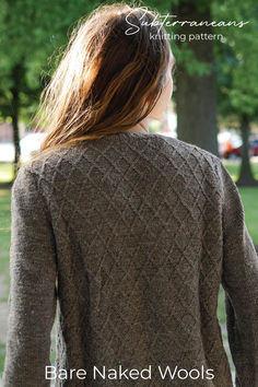 the back of a woman's sweater with text that reads bare naked wools