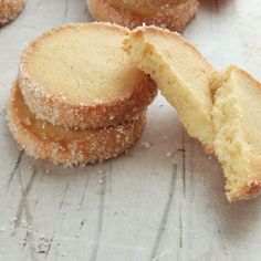 french butter cookies are stacked on top of each other with the words, crisp, rich, buttery